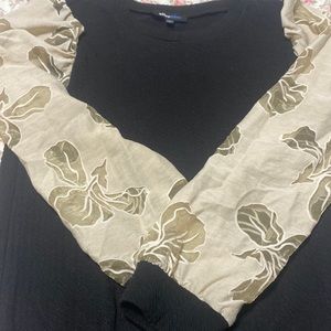 High quality black top, nice material, I bought from Dillards